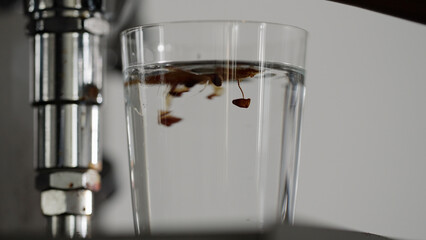 making espresso tonic with coffee machine