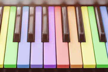 Rainbow colored piano keys. LGBT concept. Soft focus.