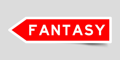 Red color arrow shape sticker label with word fantasy on gray background