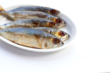 Salted fish on white background.