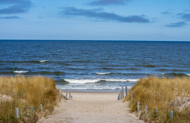 beach path sand dunes and sea