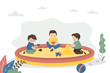 Happy boys play in sandbox. Children build pyramids and sandcastles. Cute preschoolers on playground. Kids games, entertainment, development of imagination