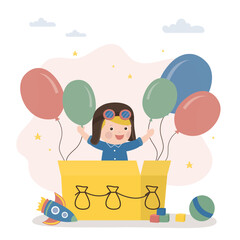 Cute boy is playing hot balloon pilot. Child flies on an imaginary balloon. Funny preschooler game, imagination, creativity and dreams. Adorable kid playing toys.