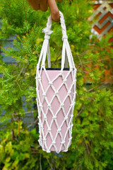 Refilled mug in mesh bag with nature background ,Environmental friendly,Healthy green,Zero waste, mindfulness conscious lifestyle concept