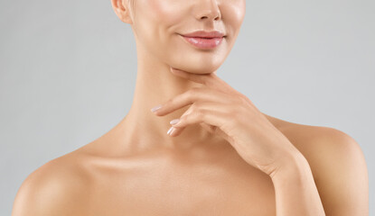 Beauty Lips Close up. Woman Chin Massage and Neck Lifting Cosmetology over White studio Background....