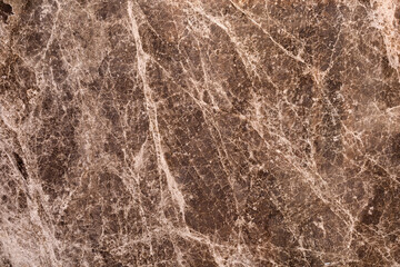 Old brown marble wall texture. Abstract textured background