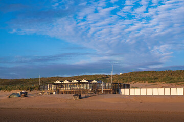 Fototapeta premium Beach hut in the evening on the beach of Egmond aan Zee/NL