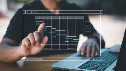 Analyst working with computer in Business Analytics and Data Management System to make report with KPI and metrics connected to database. Corporate strategy for finance, operations, sales, marketing