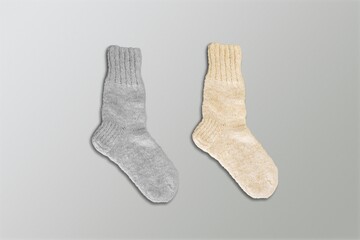 Set of soft socks on gray background