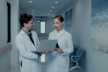 Doctor spend the break time to upgrade professional knowledge by reviewing medical publications,...