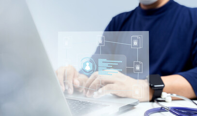 Businessman working with laptop computer with icons