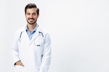 Fototapeta premium Man doctor in a white coat with a stethoscope smile with teeth and good test results looking into the camera on a white isolated background, copy space, space for text, health