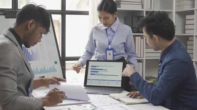 Accounting Concepts Asia Business Consultants meeting to analyze and discuss the situation regarding financial reports in the conference room. financial investment advisor