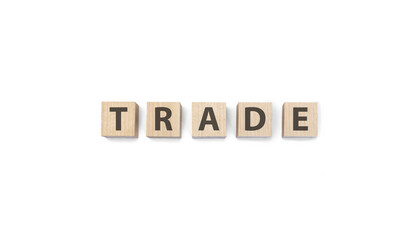 trade word on wooden cubes on a white background