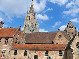 Bruges, April 2023: Magnificent facades of the buildings of Bruges, the Venice of the North