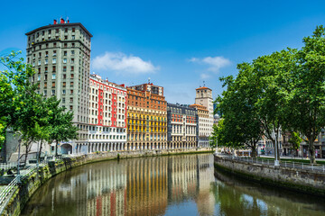Nervion river embankment in Bilbao. High apartment buildings along the Nervion River, Bilbao, Spain.