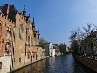 Naklejka premium Bruges, April 2023: Magnificent facades of the buildings of Bruges, the Venice of the North