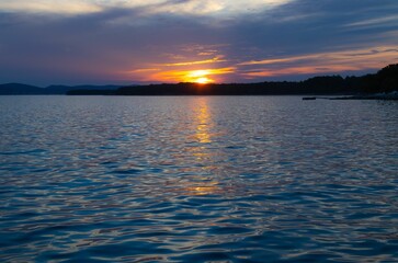 Scenic shot of sunset over the sea in  Pine beach, Croatia