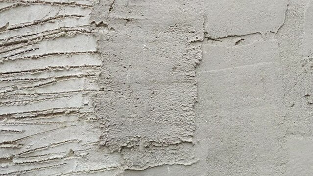 Plastering the wall, applying lime mortar on the wall