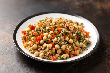 Chickpea Salad with Quinoa, sweet red pepper, herbs and lemon. Healthy food