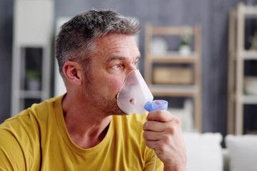 Asthma Patient Breathing Using Oxygen Mask - obrazy, fototapety, plakaty