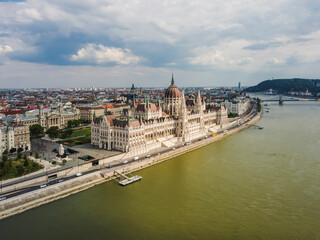 Fototapeta premium Aerial vIew by drone. Summer. Budapest, Hungary. Danube river. Parlament of Hungary.