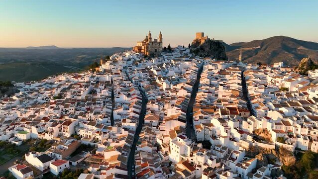 aerial view of Castillo de Olvera Towering On White Village In Olvera, Province of Cadiz, Spain
