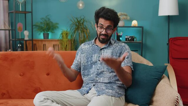 Indian man raising hands asking what why reason of failure, disbelief irritation by troubles, trendy social media meme, anti lifehacks, ridicules people who complicate simple tasks for no reason, home