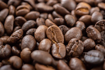 Fresh roasted brown coffee beans background