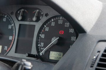 Speedometer of car and arrow are at zero