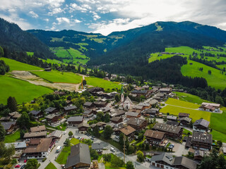 Fototapeta na wymiar Aerial view Alpbach town in Kufstein, Tirol. Austria by drone. Alps mountains.