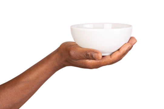 Human hand holding an empty white bowl isolated on white or transparent background