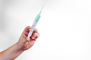 syringe of Vaccine in doctor hands in hospital