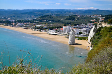Panorama of the Bay of Vieste with Pizzomunno, the beach, on a sunny day
