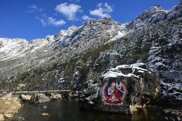 Stone carvings and paintings of Tibetan Buddha statues in the mountains of western Sichuan, China
