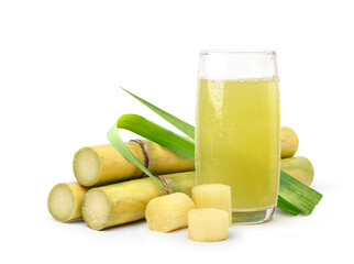 Fresh squeezed sugar cane juice with fresh cane sliced isolated on white background.