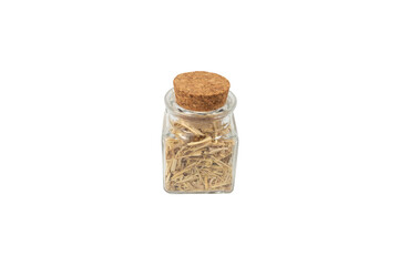 siberian ginseng in latin Eleutherococcus senticosus in a glass jar isolated on white background. Medicinal herb. has a history of use in folklore and traditional Chinese medicine. 