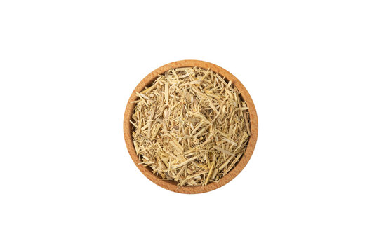 siberian ginseng in latin Eleutherococcus senticosus in wooden bowl isolated on white background. in wooden bowl isolated on white background. Medicinal herb.