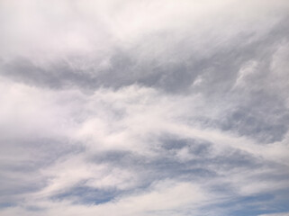 Obraz premium Cloudscapes. The white clouds have almost merged with the sky