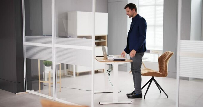 Adjustable Height Desk Stand In Office