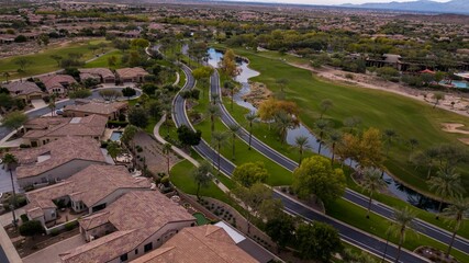 Fototapeta na wymiar Aerial drone view of the Trilogy Golf Club on a sunny day