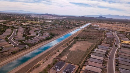 Aerial view of the Central Arizona Project and new homes in VIstancia, Arizona
