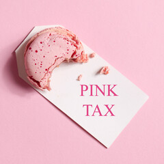 pink tax concept. bitten big pink macaroons. copy space square