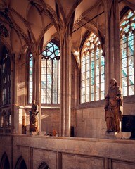 Interior of St Barbara's Cathedral with sculptures by the windows in Kutna Hora, Czechia