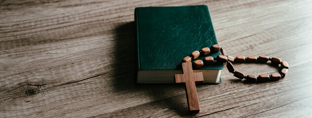 Cross and bible on the table