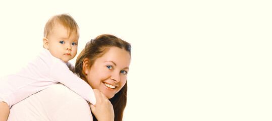 Portrait of happy smiling mother playing with baby together on white background