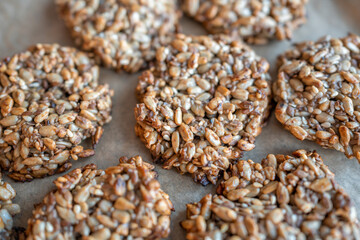 Vegan cookies made of banana and different seeds, photographed with natural light