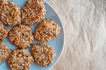 Vegan cookies made of banana and different seeds, photographed with natural light