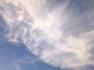 Mass of whitish clouds cover the sky by the cloud