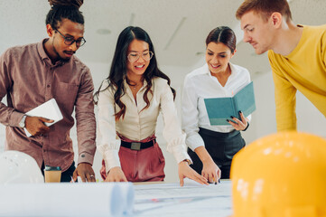 Portrait of a vietnamese asian architect woman holding a meeting in an office